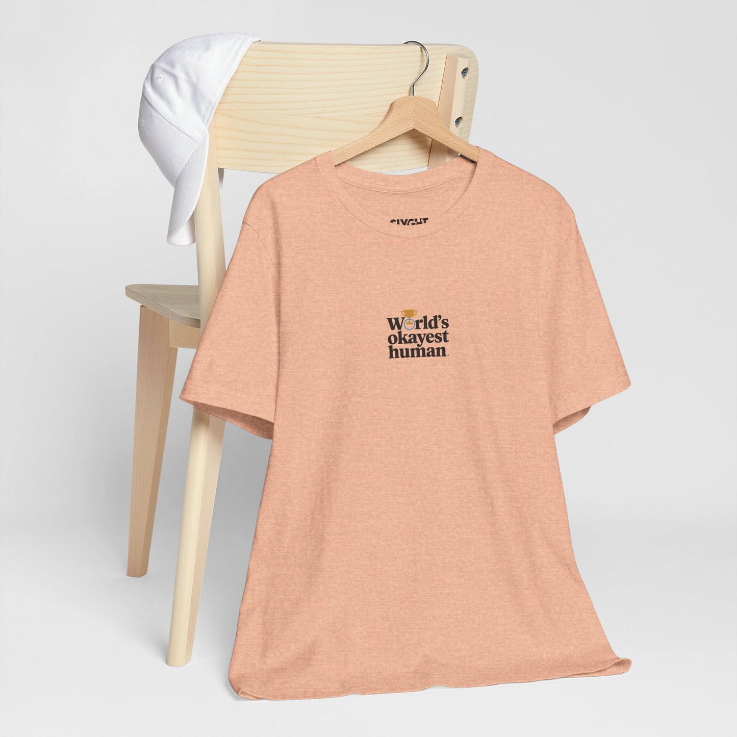 "World's Okayest Human" Tee – Because Perfection is Overrated -color - Heather Peach - available in USA