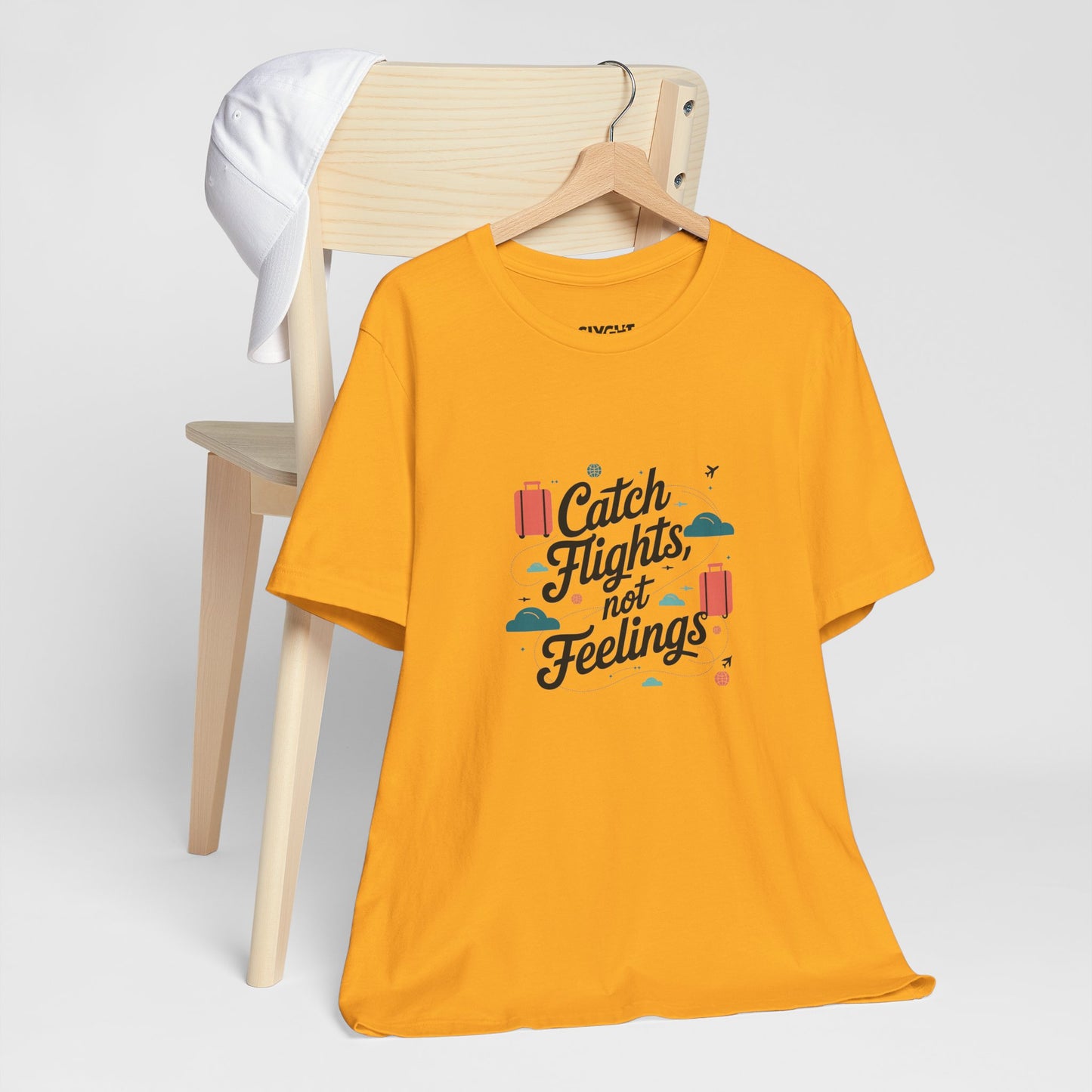 "Catch Flights, Not Feelings" Unisex Tee – For the Jetsetter with a Heart of Steel -color - Gold - available in USA