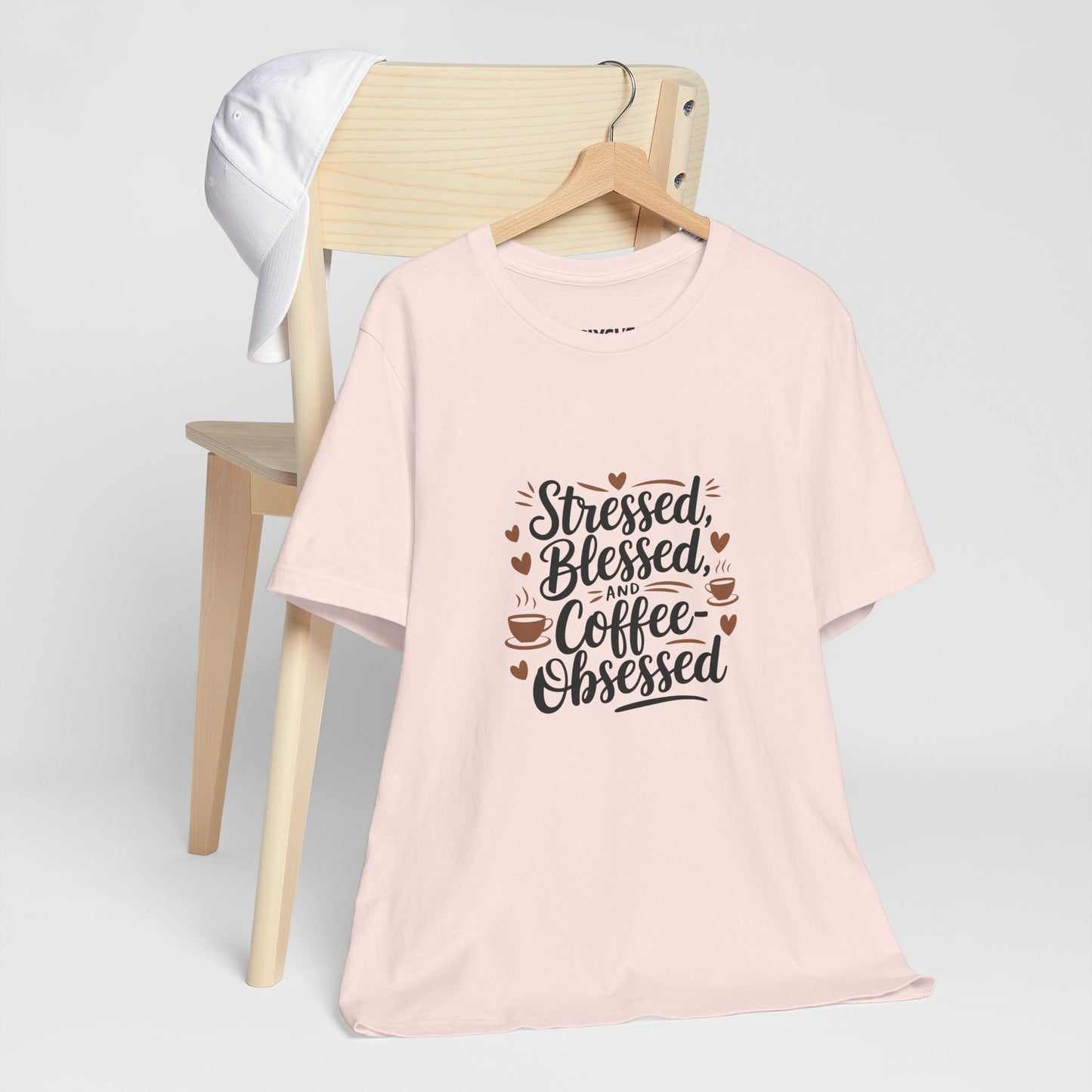 "Stressed, Blessed & Coffee-Obsessed" Unisex Short Sleeve Tee – Because Coffee is a Lifestyle -color - Soft Pink - available in USA