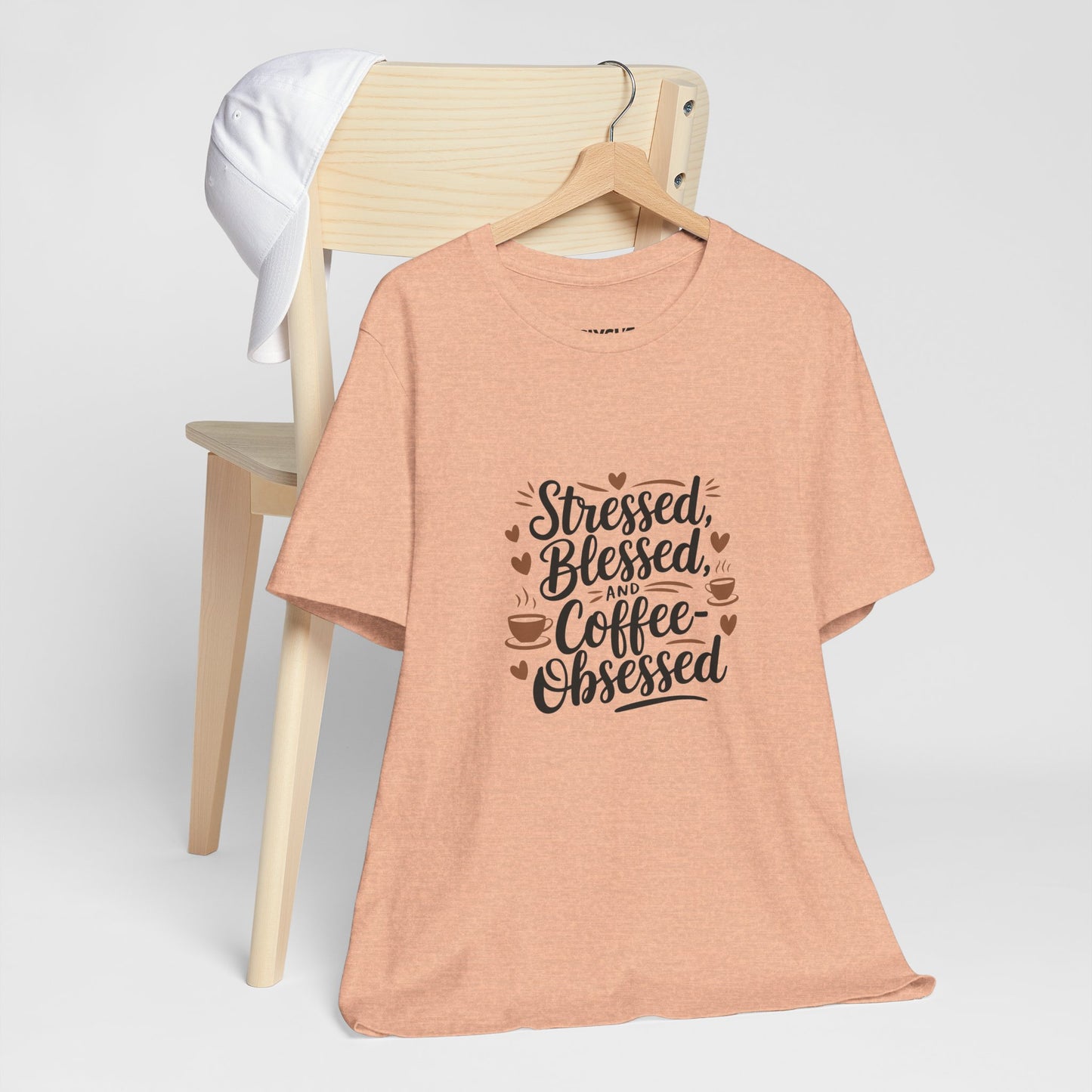 "Stressed, Blessed & Coffee-Obsessed" Unisex Short Sleeve Tee – Because Coffee is a Lifestyle -color - Heather Peach - available in USA